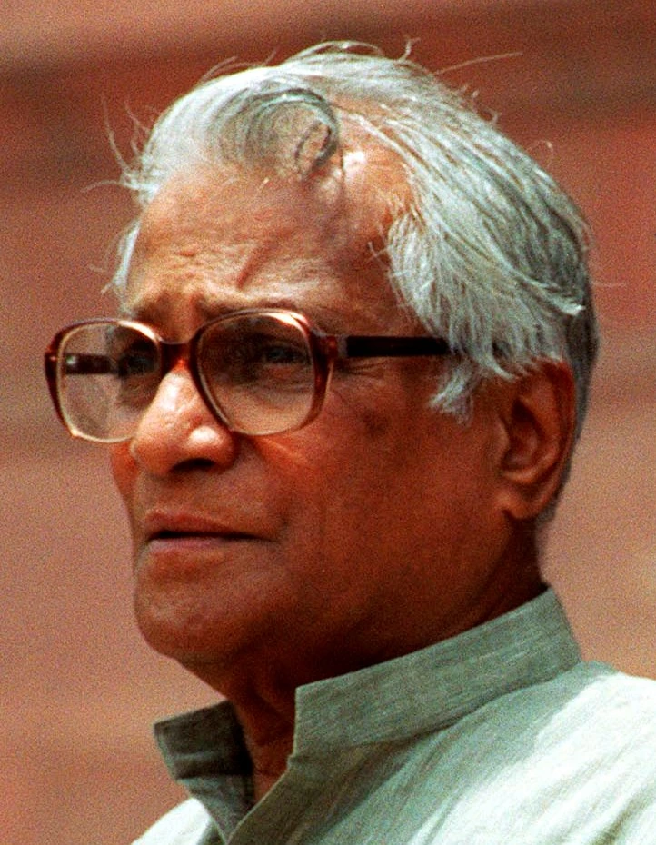 Portrait of Indian politician George Fernandes wearing glasses and a light-colored kurta